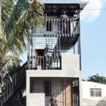 Low cost House In Mozambique Features Corrugated Iron And Wood Design